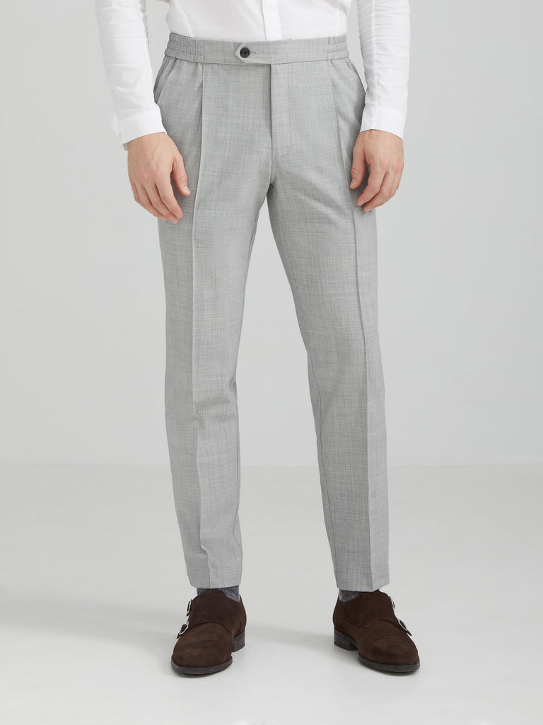 The Vanta Pant by SENECA in Black. Performance AYR fabric from Italy: 4-way stretch, exceptionally soft, machine washable, wrinkle resistant. Comfortable and versatile men's trousers with elastic waistband, 4 pockets, and a button zipper fly. Replace your chinos, jeans, and khakis perfect for back to the office. caption: Justin is 6'1