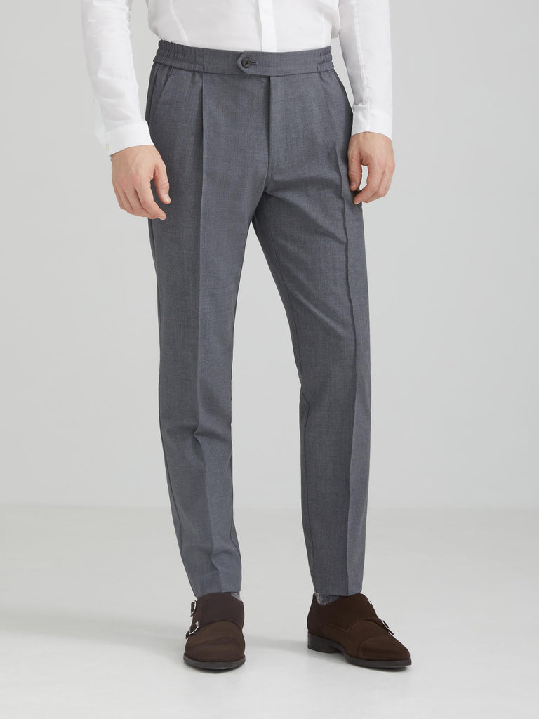 The Vanta Pant by SENECA in Black. Performance AYR fabric from Italy: 4-way stretch, exceptionally soft, machine washable, wrinkle resistant. Comfortable and versatile men's trousers with elastic waistband, 4 pockets, and a button zipper fly. Replace your chinos, jeans, and khakis perfect for back to the office. caption: Justin is 6'1